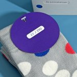 Sokken met genummerd label – Cindy Moorman